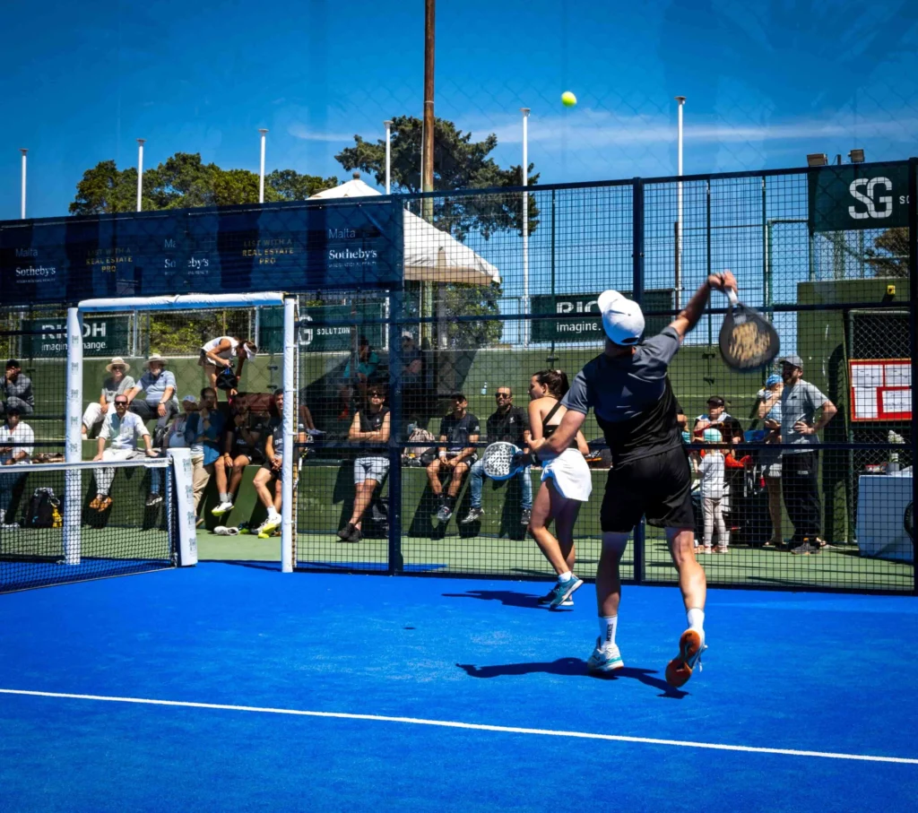 Padel player just about to hot the ball at the Marsa Sports Club